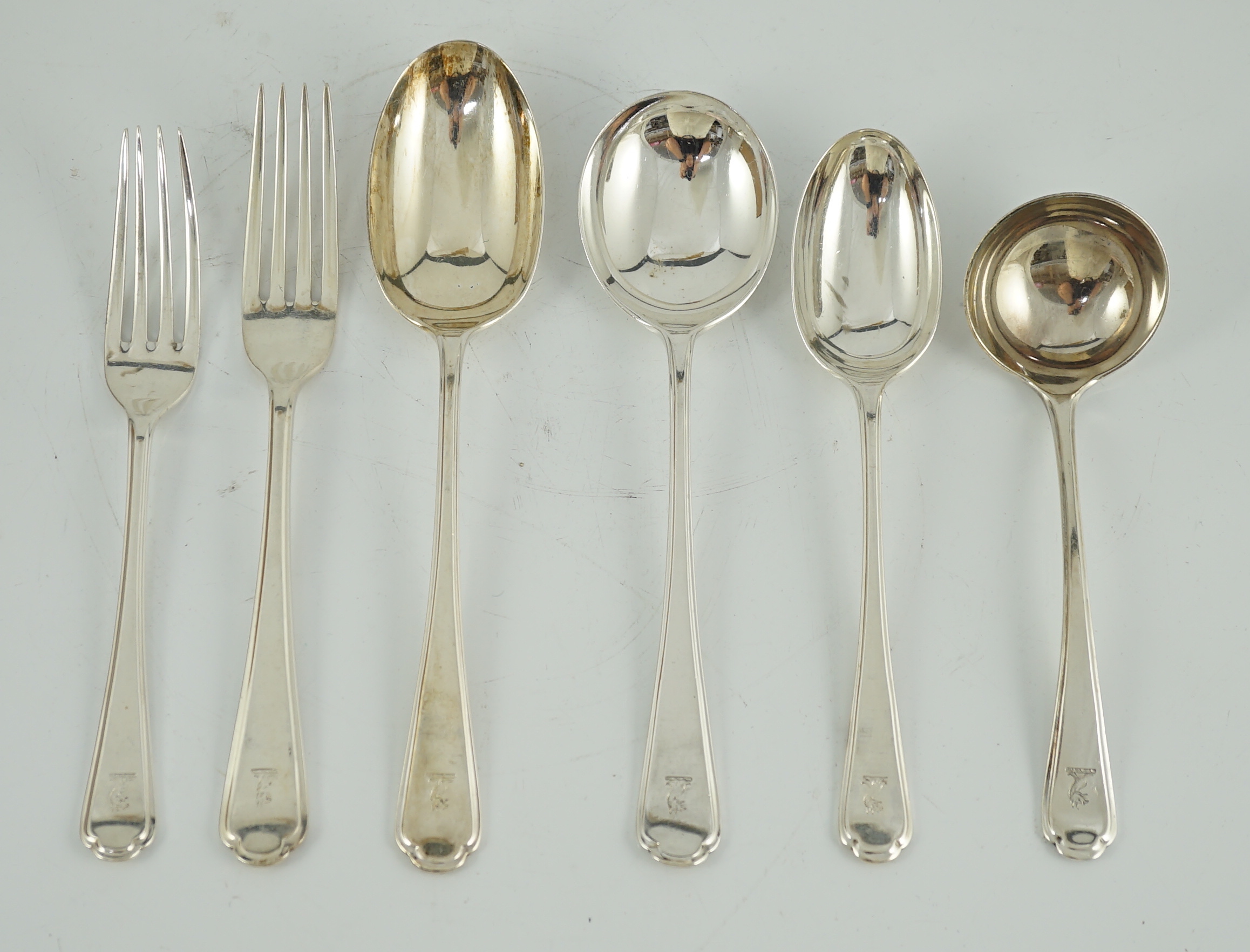 A part canteen of George V and later silver flatware by Walker & Hall